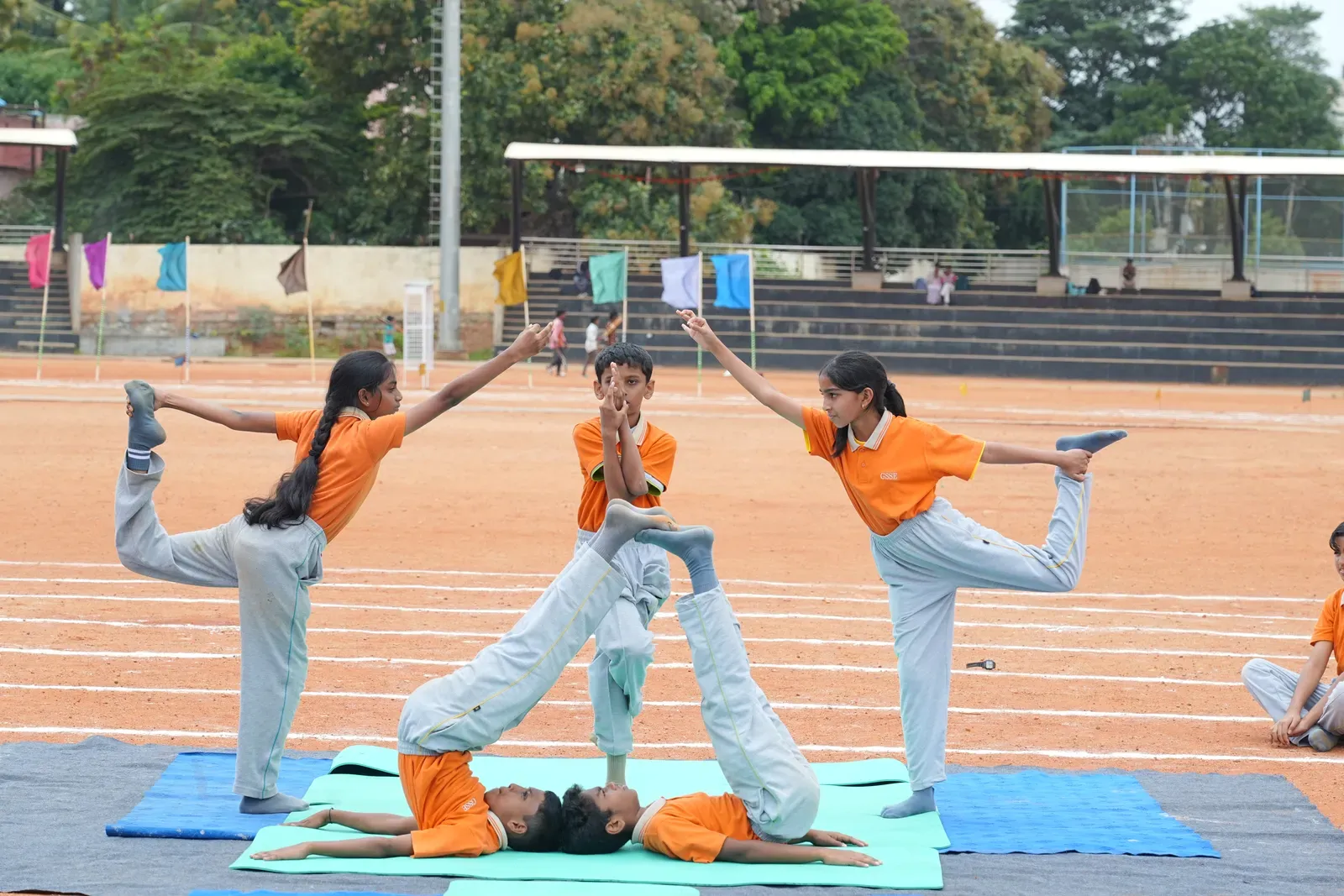 Students practising yoga on International Yoga Day, photo 3 of 8