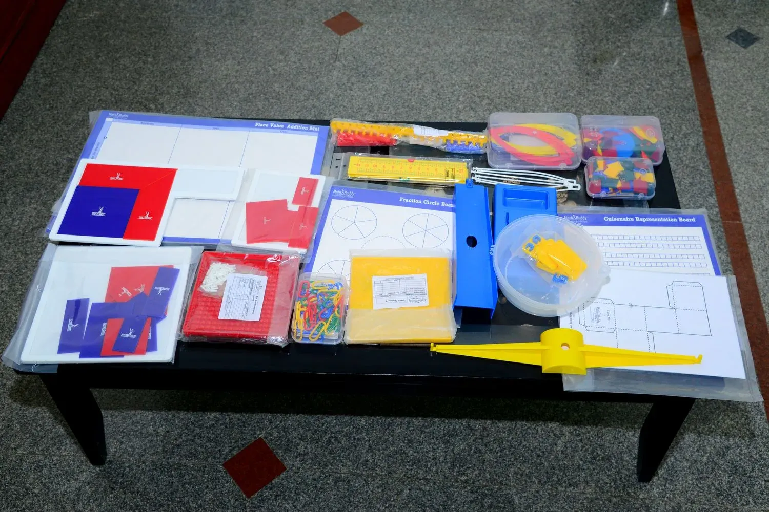 Math lab manipulatives laid out on a table