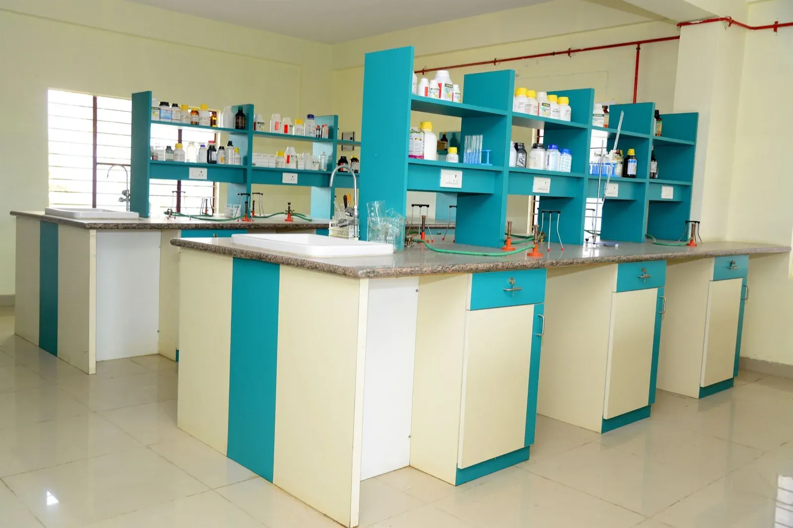 A composite chemistry lab bench with equipment and reagents
