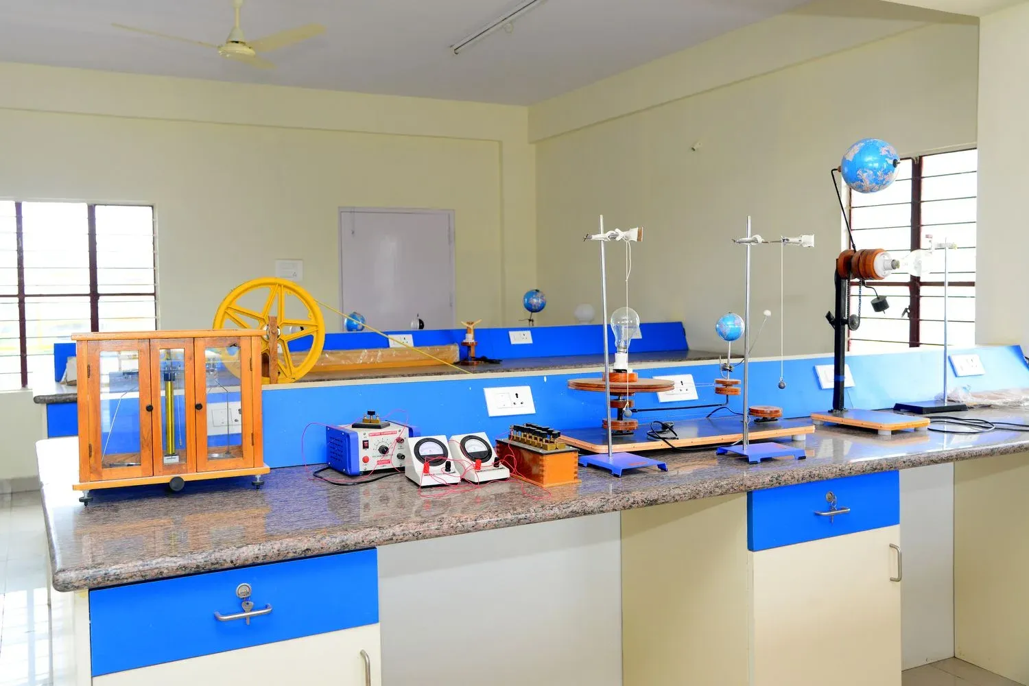 A physics lab bench with demonstration equipment