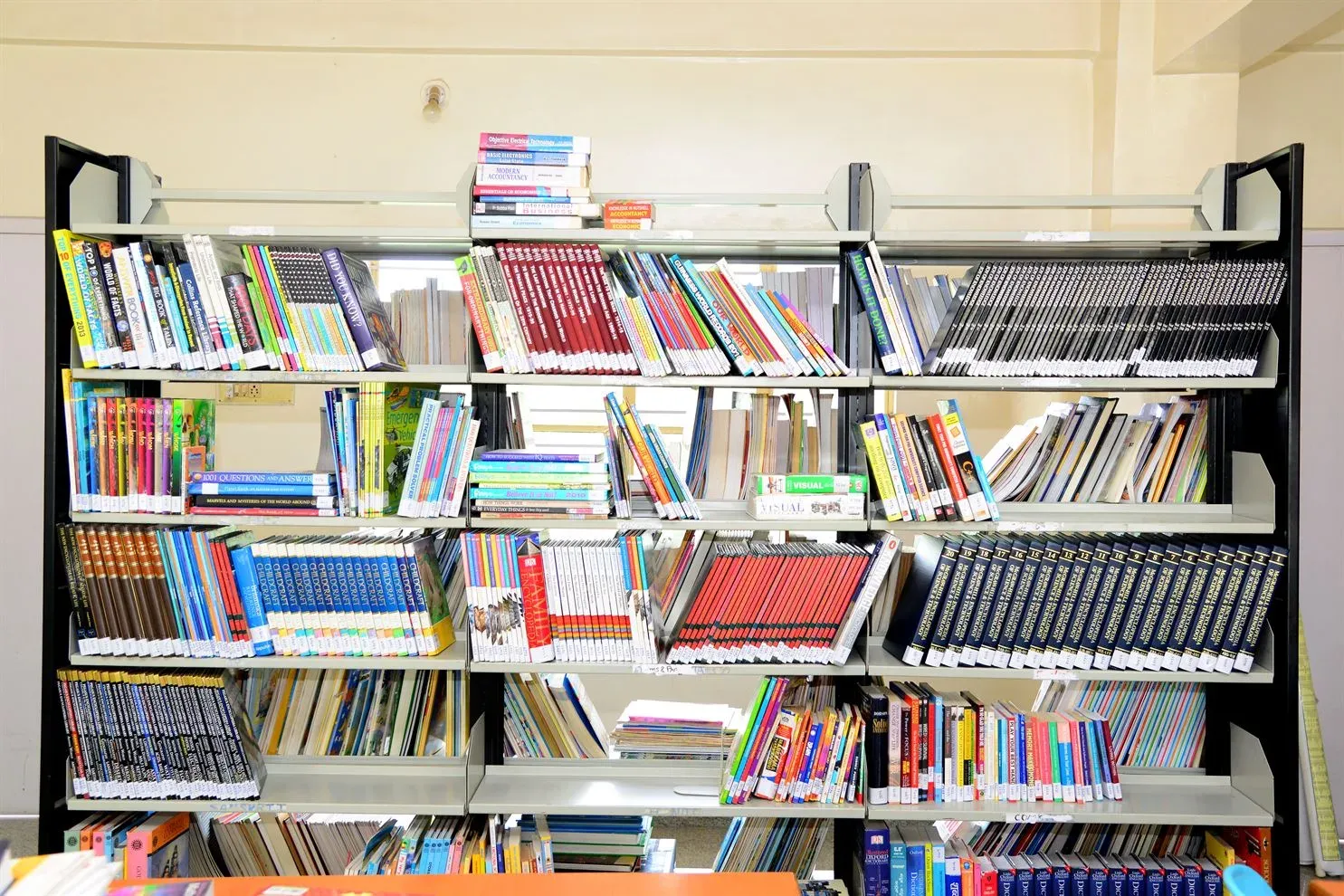 Rows of bookshelves in the school library